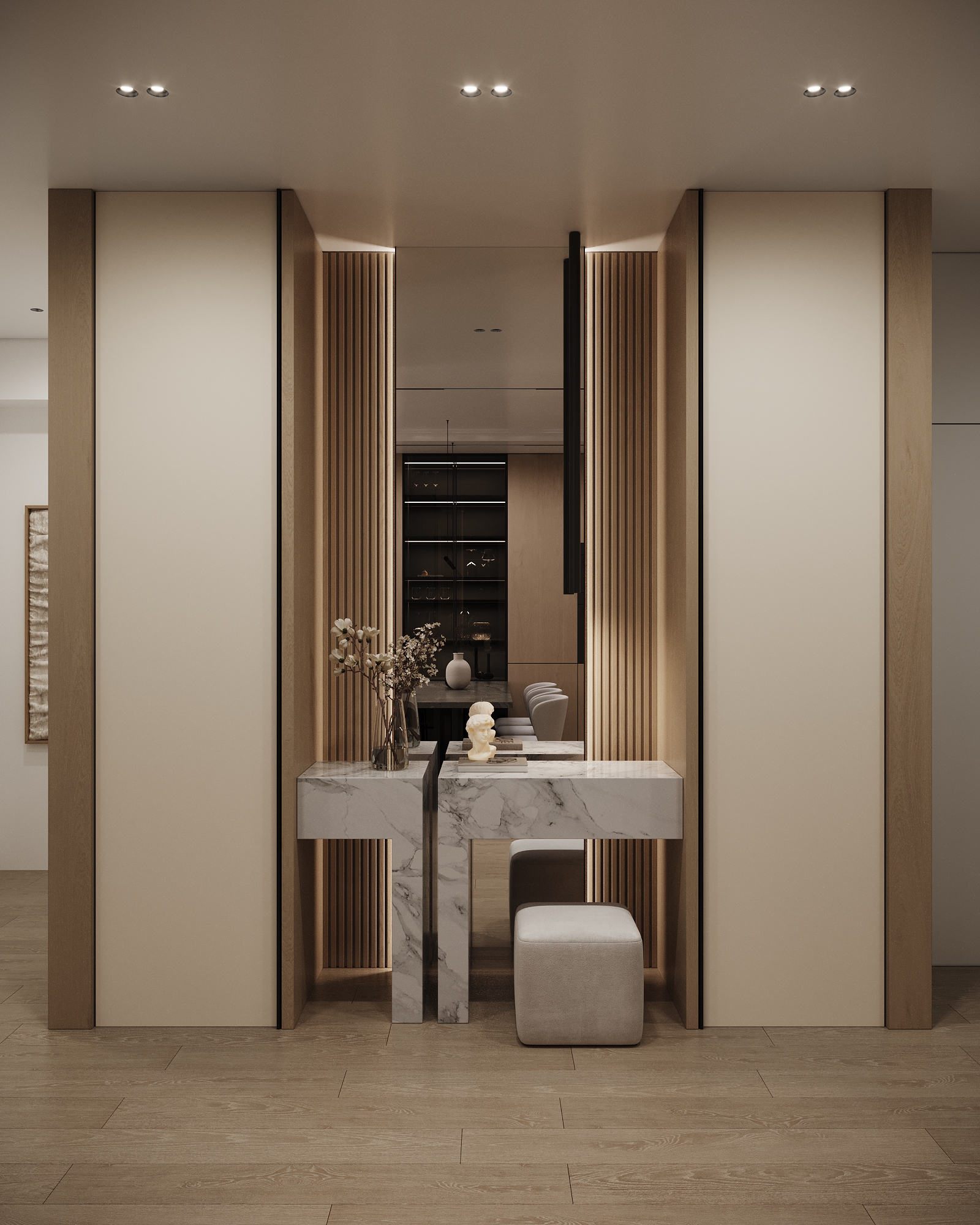Elegant marble vanity with built-in storage, wooden wall panels, and upholstered ottoman.