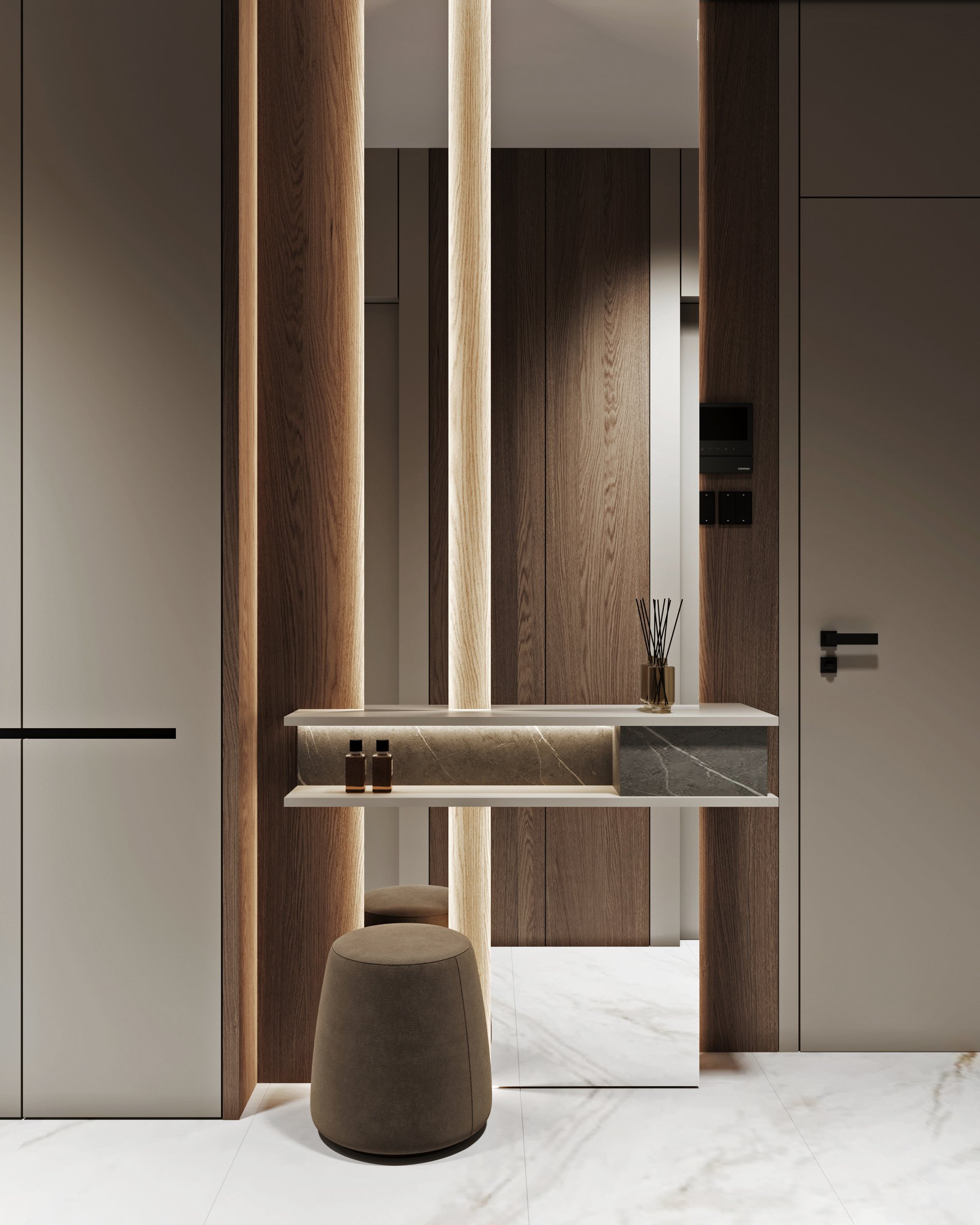 Minimalist entryway featuring marble console table with LED-lit wooden columns and upholstered ottoman seating.