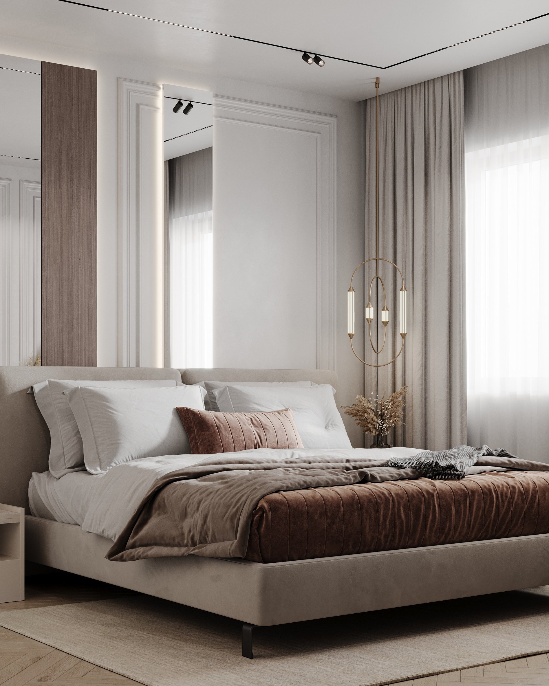 Elegant bedroom featuring white bedding, dusty rose velvet accent pillows, and gold pendant lighting with dried floral arrangements.