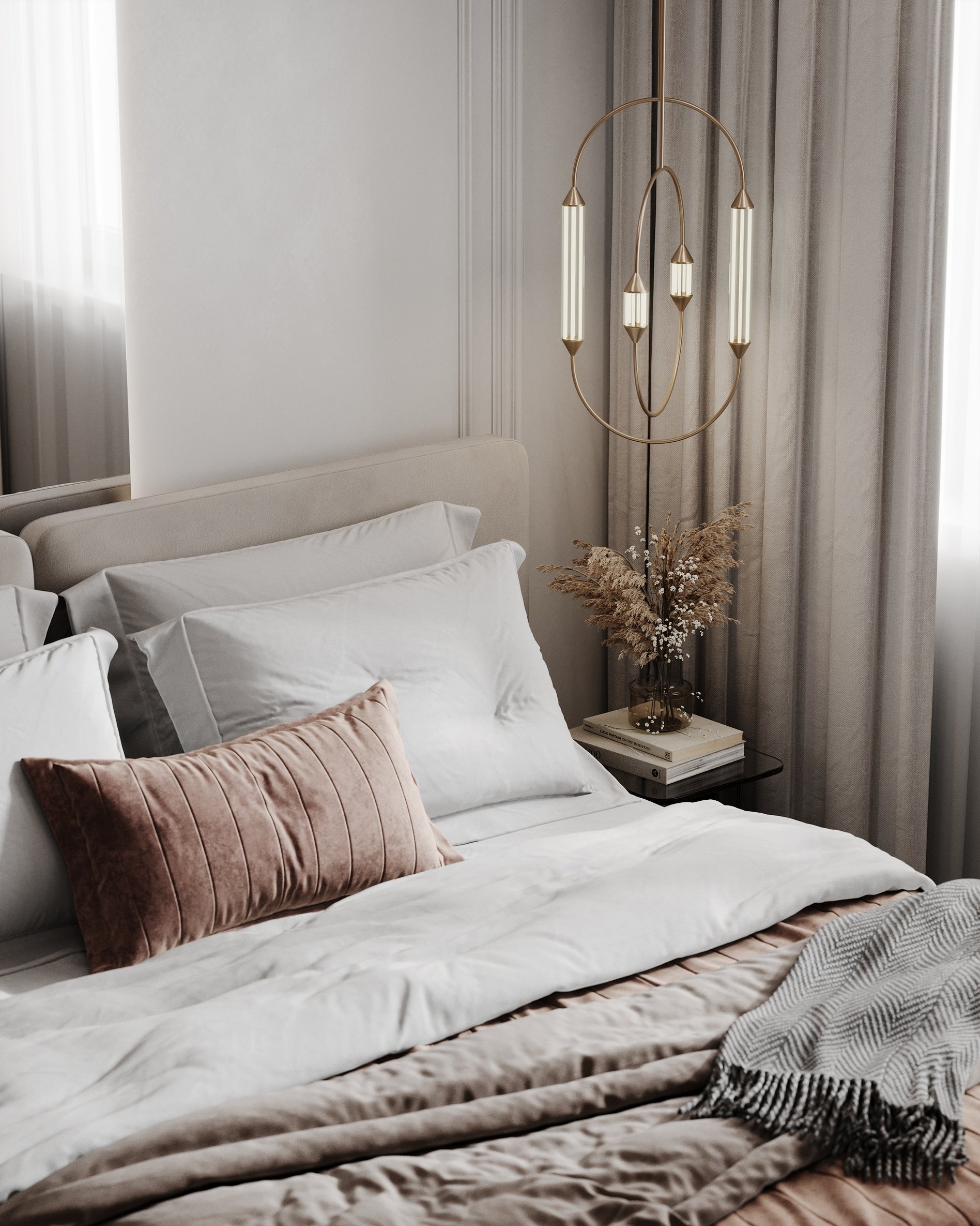 Close-up of master bed with white linens, brown velvet comforter, and decorative pillows beside a modern gold pendant light.