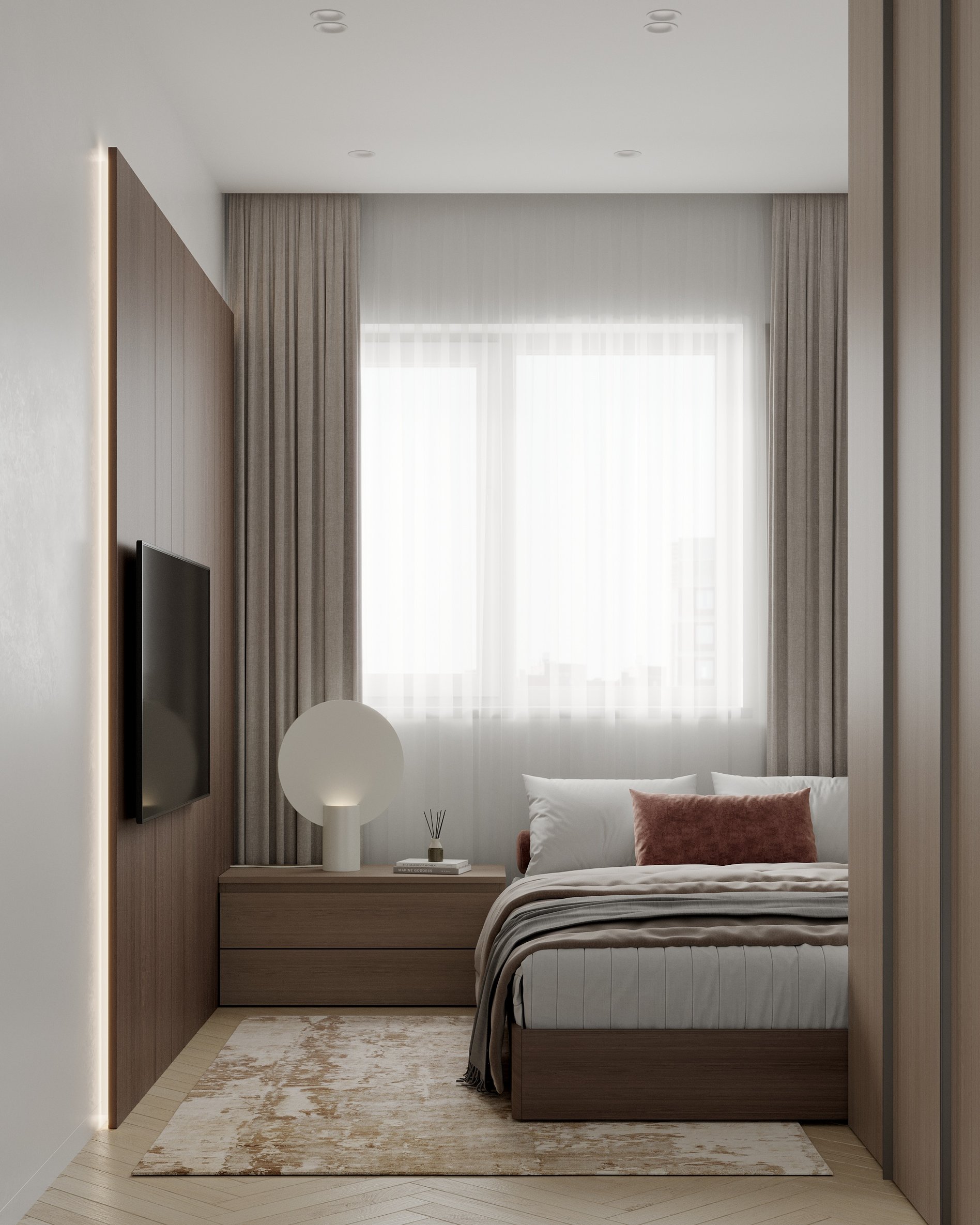 Minimalist bedroom with wooden wall paneling, built-in TV mount, and platform bed with luxurious textiles.