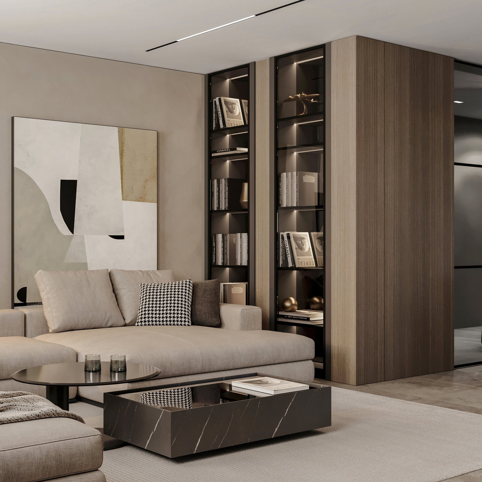 Detailed view of living room showing grey sectional sofa, built-in shelving with ambient lighting, and minimalist decor.