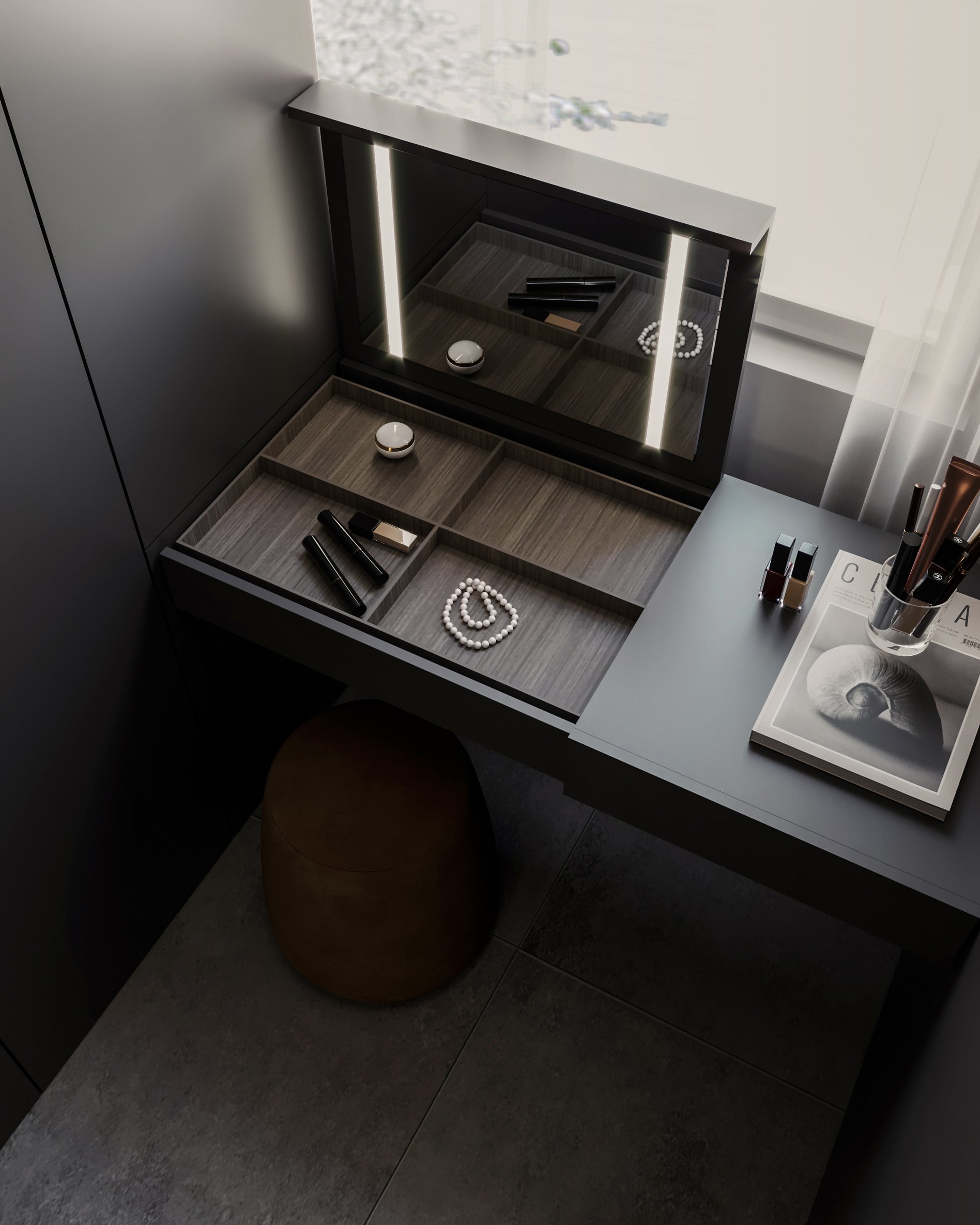 Elegant dressing area with illuminated mirror, built-in jewelry storage compartments, and leather ottoman seating.