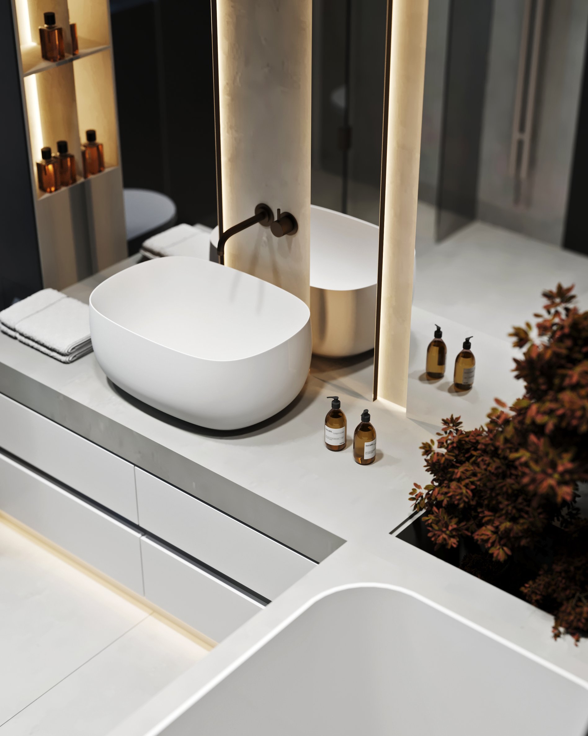 Luxury bathroom vanity detail featuring white vessel sink, matte black fixtures, illuminated columns, and built-in planters with decorative foliage.