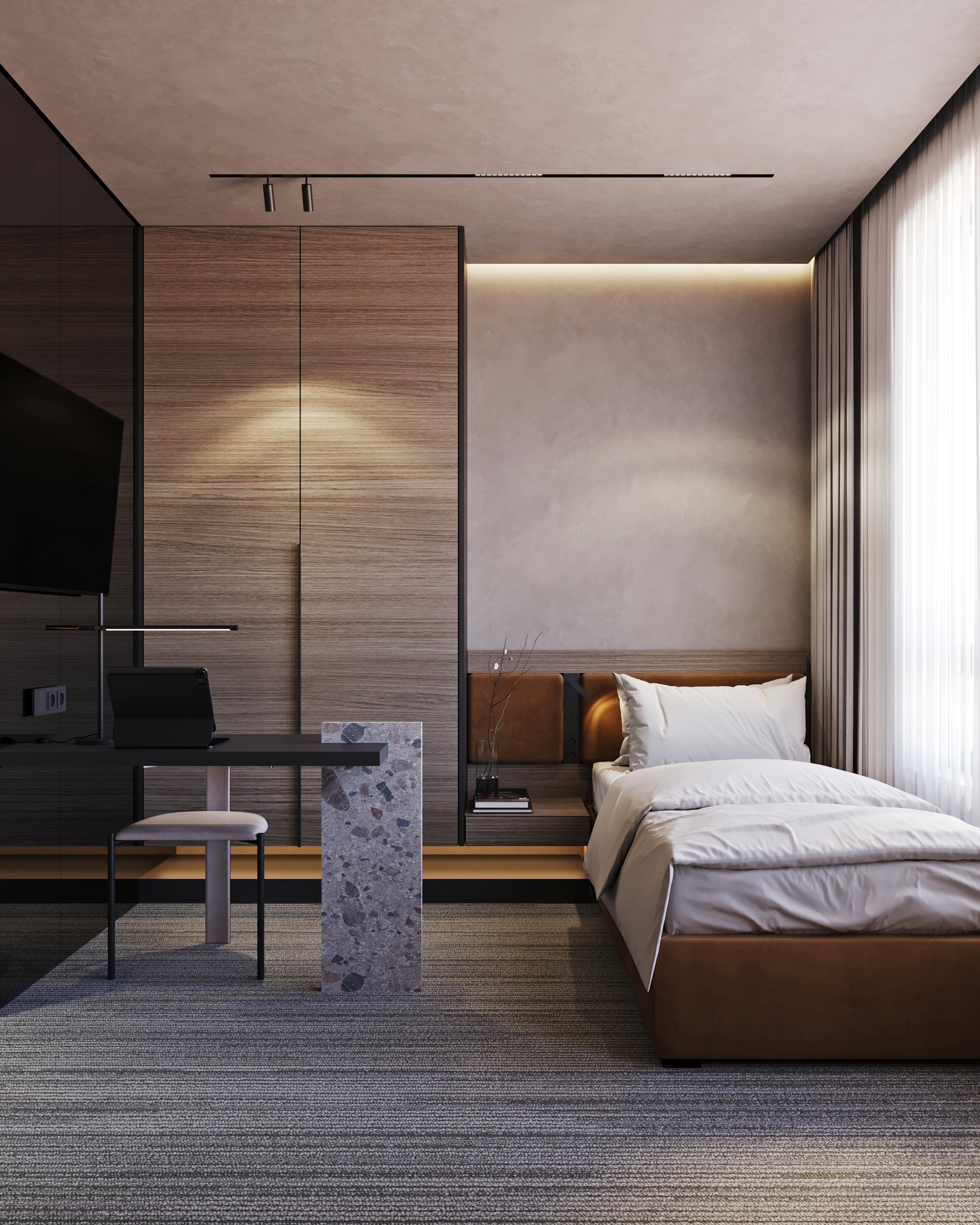 Side view of hotel room showing wooden wall panels, custom furniture, and terrazzo desk support.