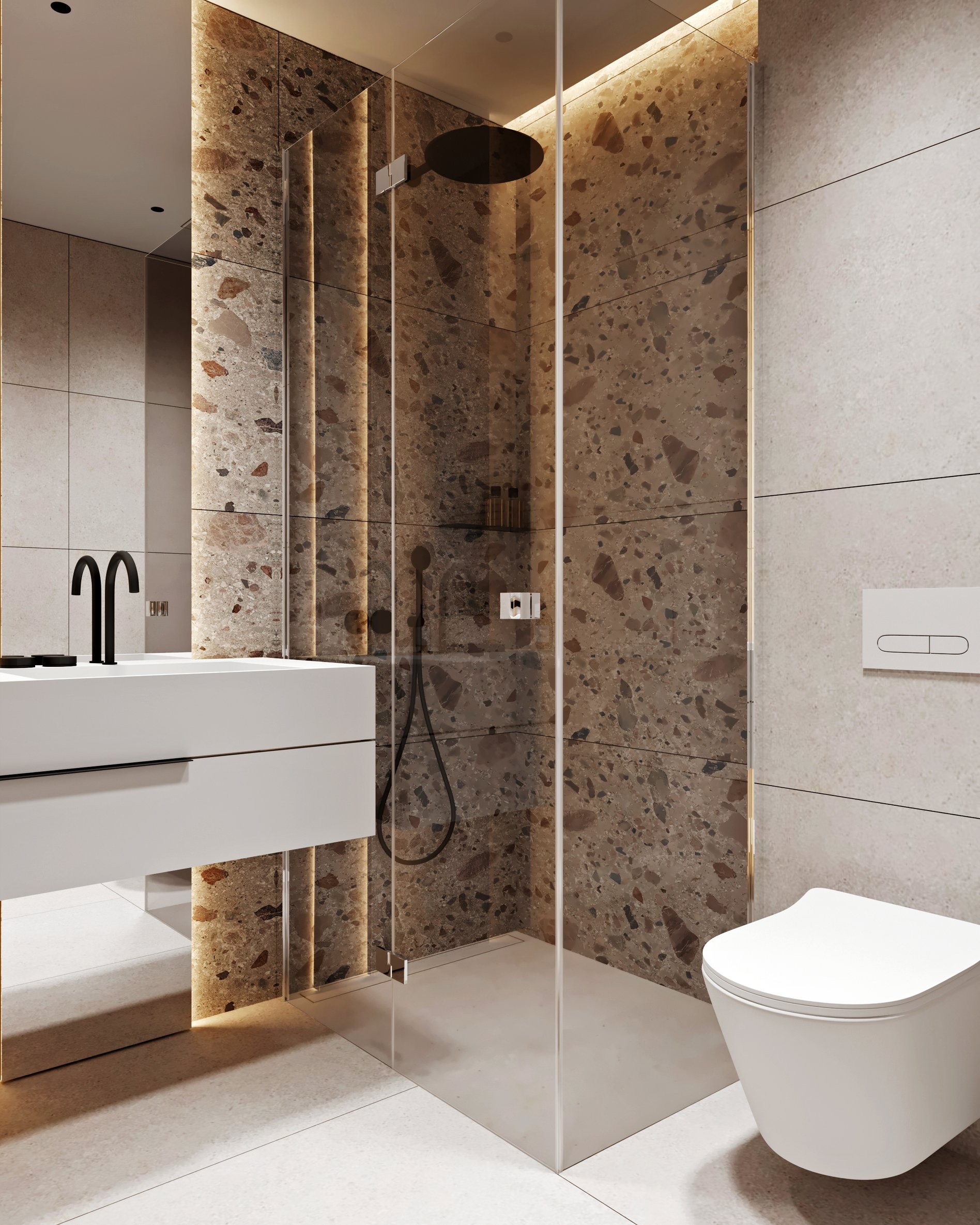 Hotel bathroom featuring terrazzo shower walls with LED strips, black fixtures, and frameless glass partition.
