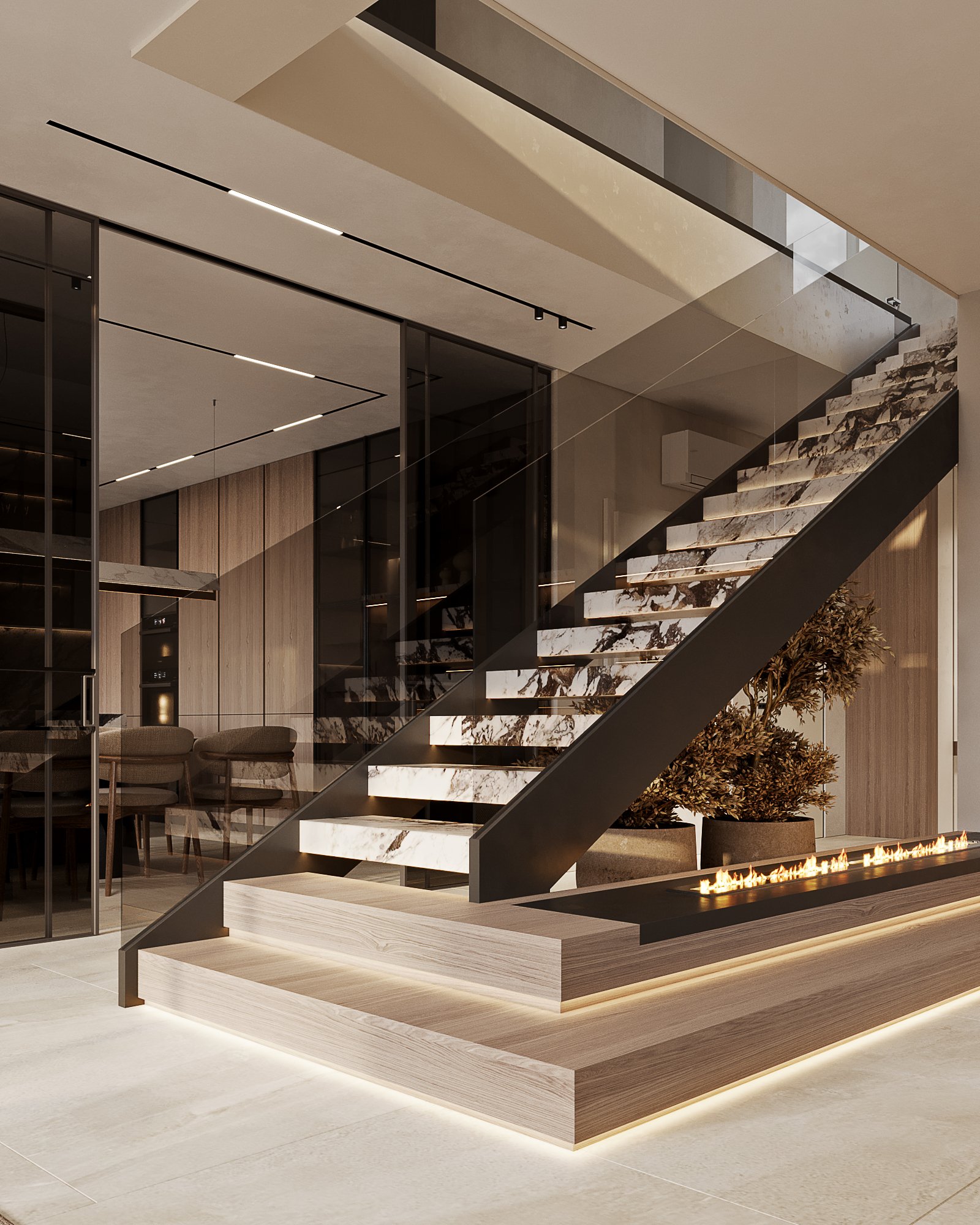 Contemporary staircase with marble treads, black metal frame, and linear gas fireplace with decorative plants.