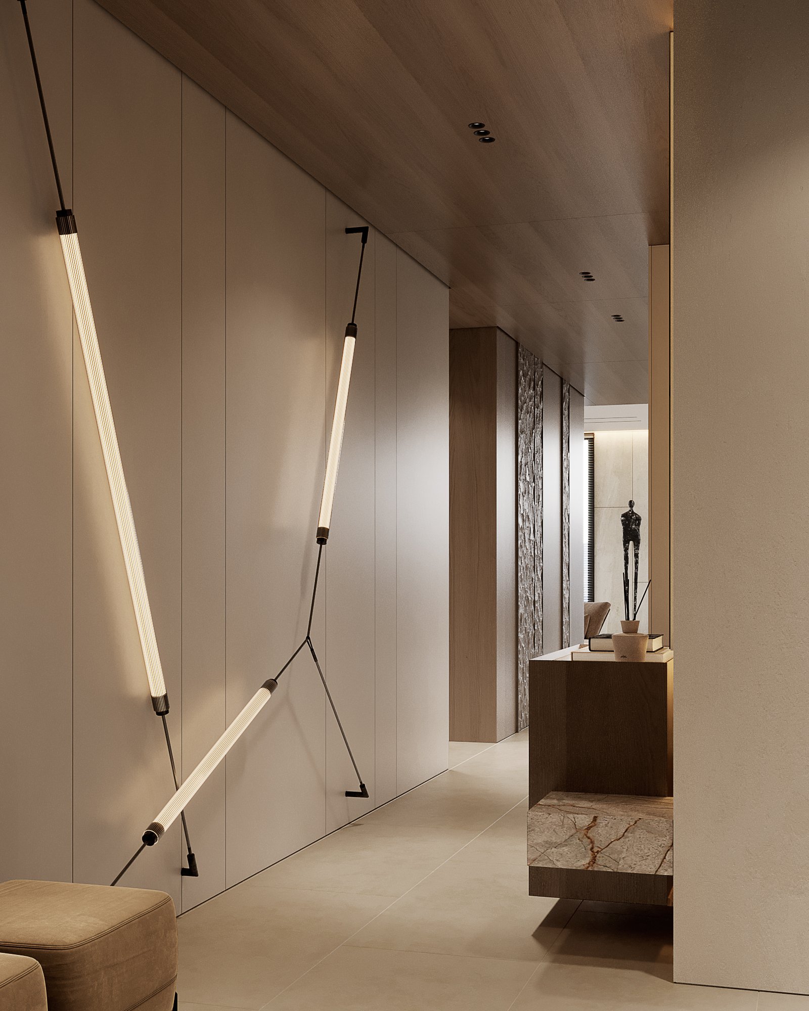 Modern hallway featuring geometric LED lighting fixtures and white paneled walls with marble accents.