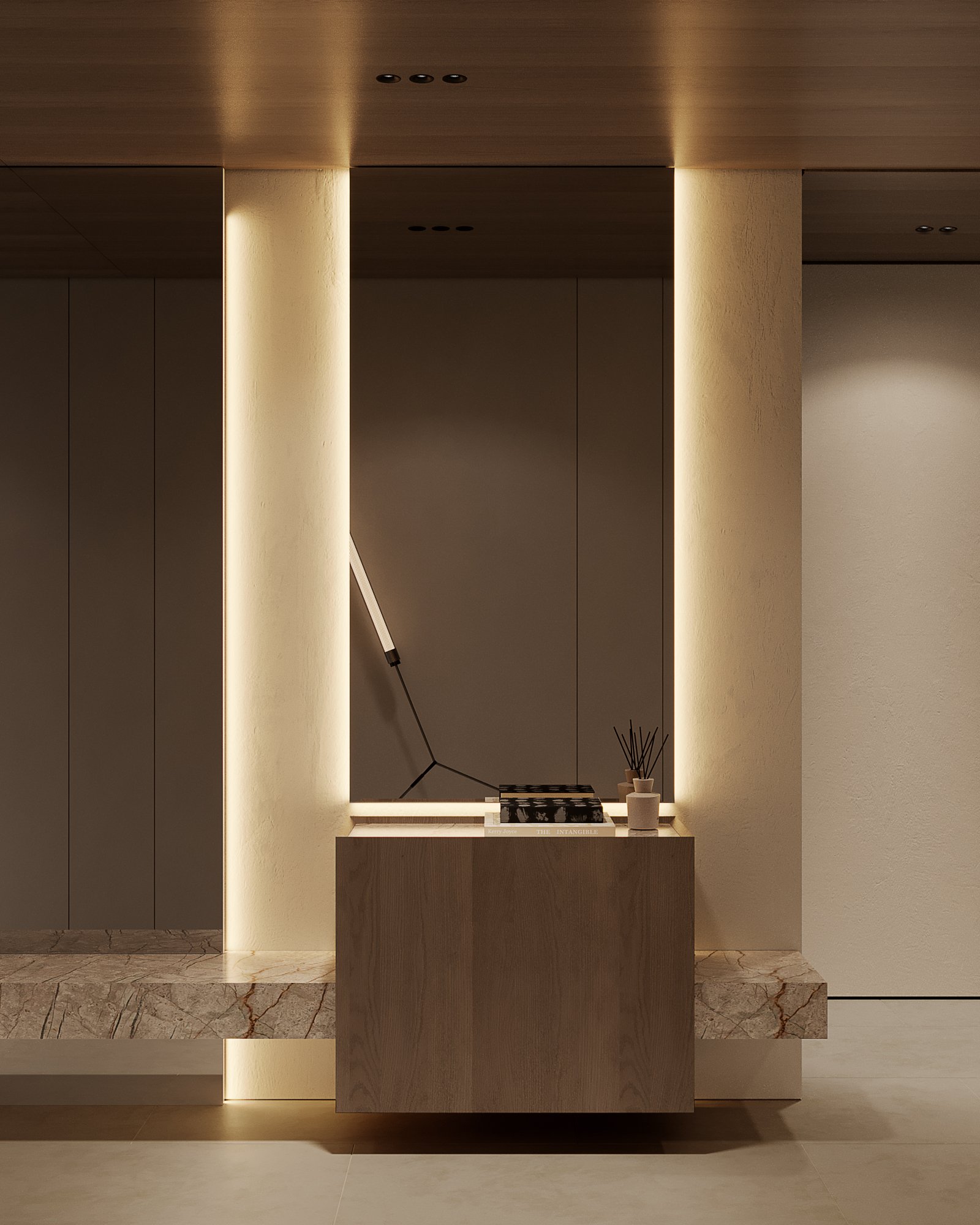 Contemporary hallway with wooden console table, ambient lighting, and sculptural art piece.
