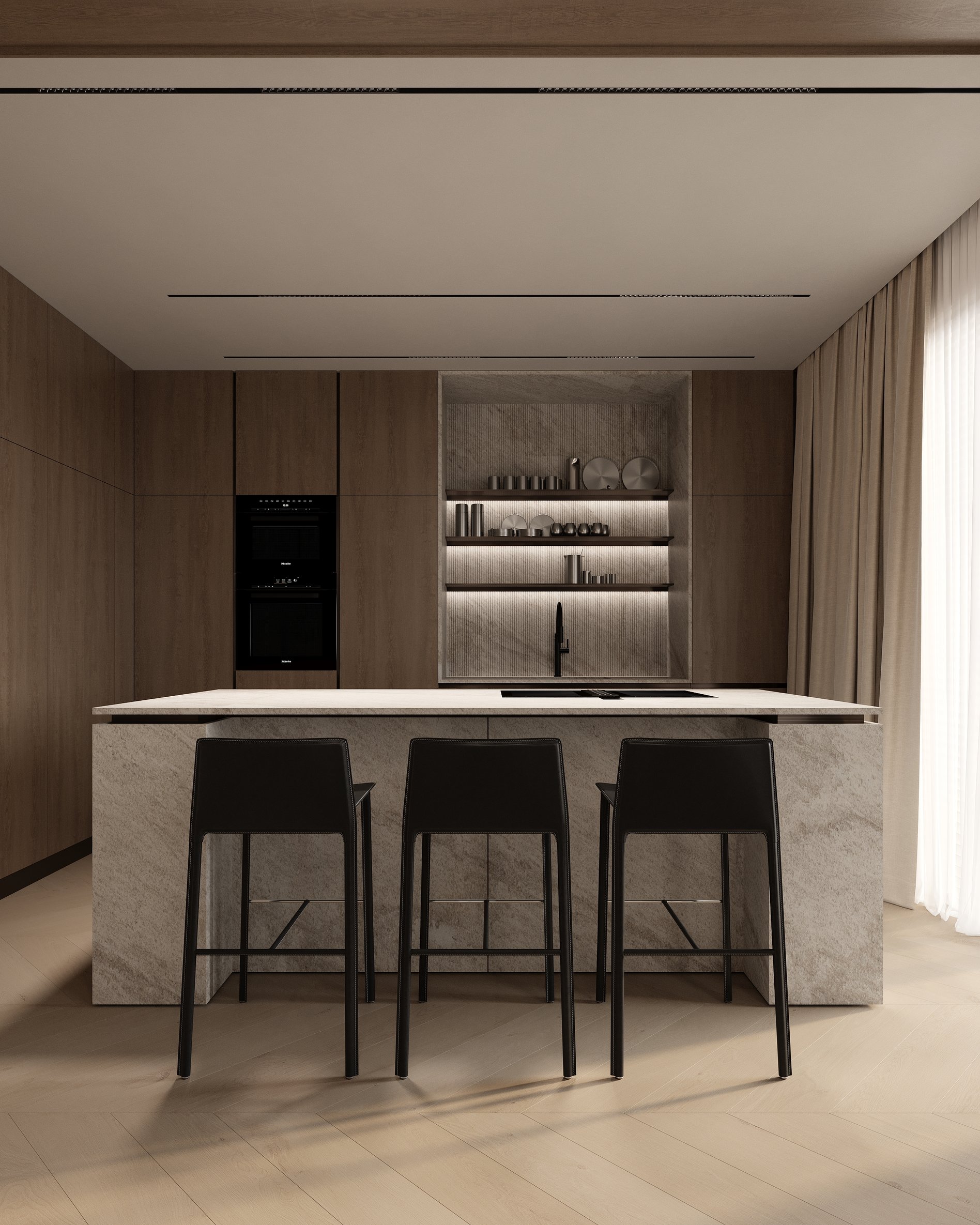 Modern kitchen with a stone island, black bar stools, built-in appliances, and minimalist open shelving with soft ambient lighting.