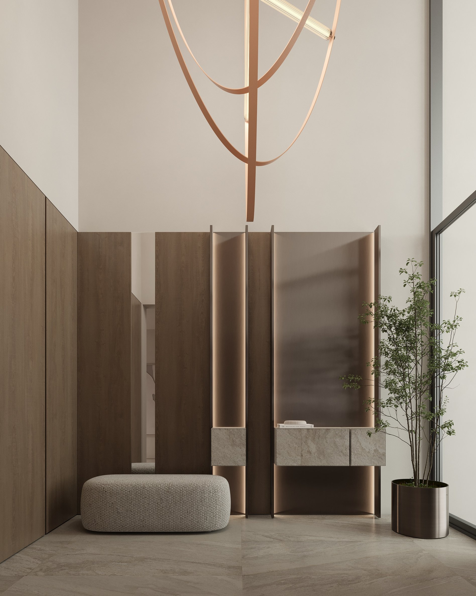 Minimalist foyer with vertical wood and stone panels, floating stone console, round ottoman, and a potted tree, illuminated by a sculptural pendant light.