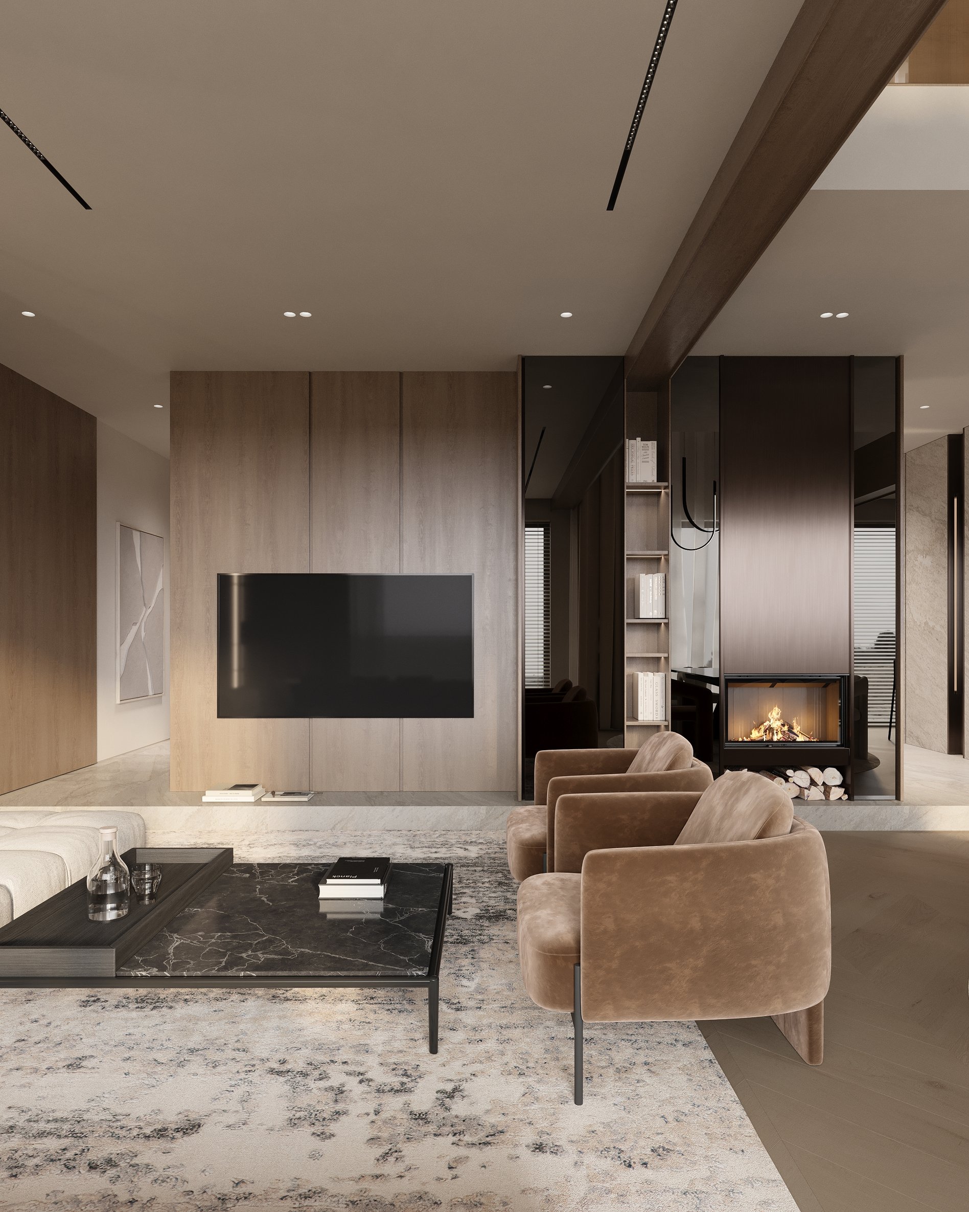 Modern living room with brown velvet armchairs, black marble coffee table, wall-mounted TV, and a contemporary fireplace with wood storage.