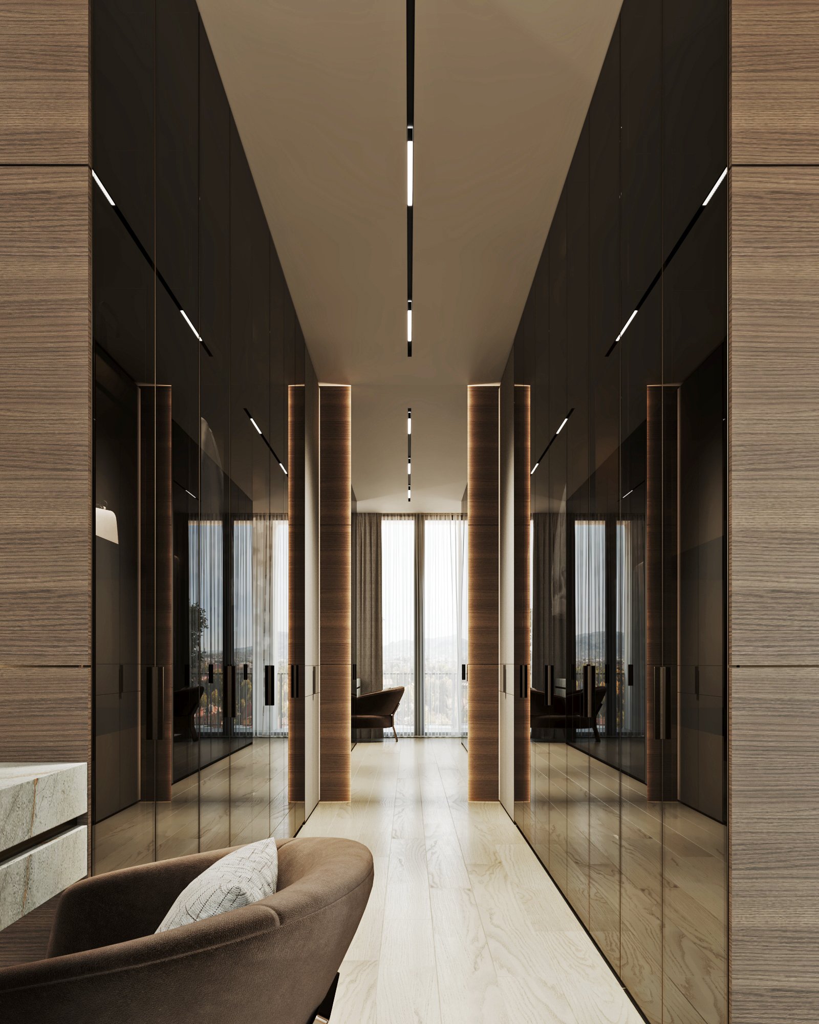 Elegant walk-in closet with mirrored walls, illuminated wooden columns, and light wood flooring.
