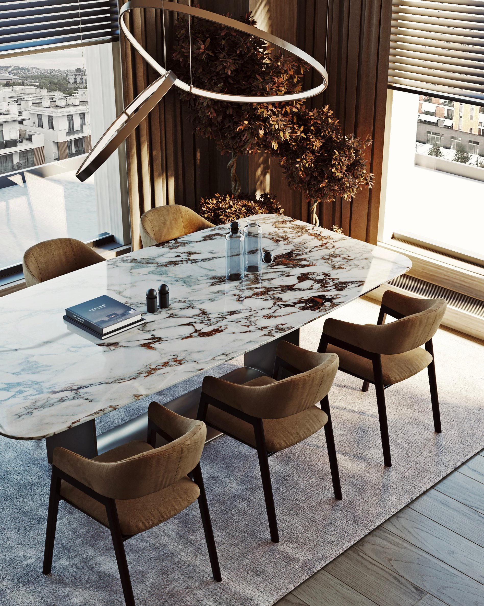 Luxury dining area featuring a marble table, upholstered chairs, and artistic LED pendant light with dried floral arrangement.