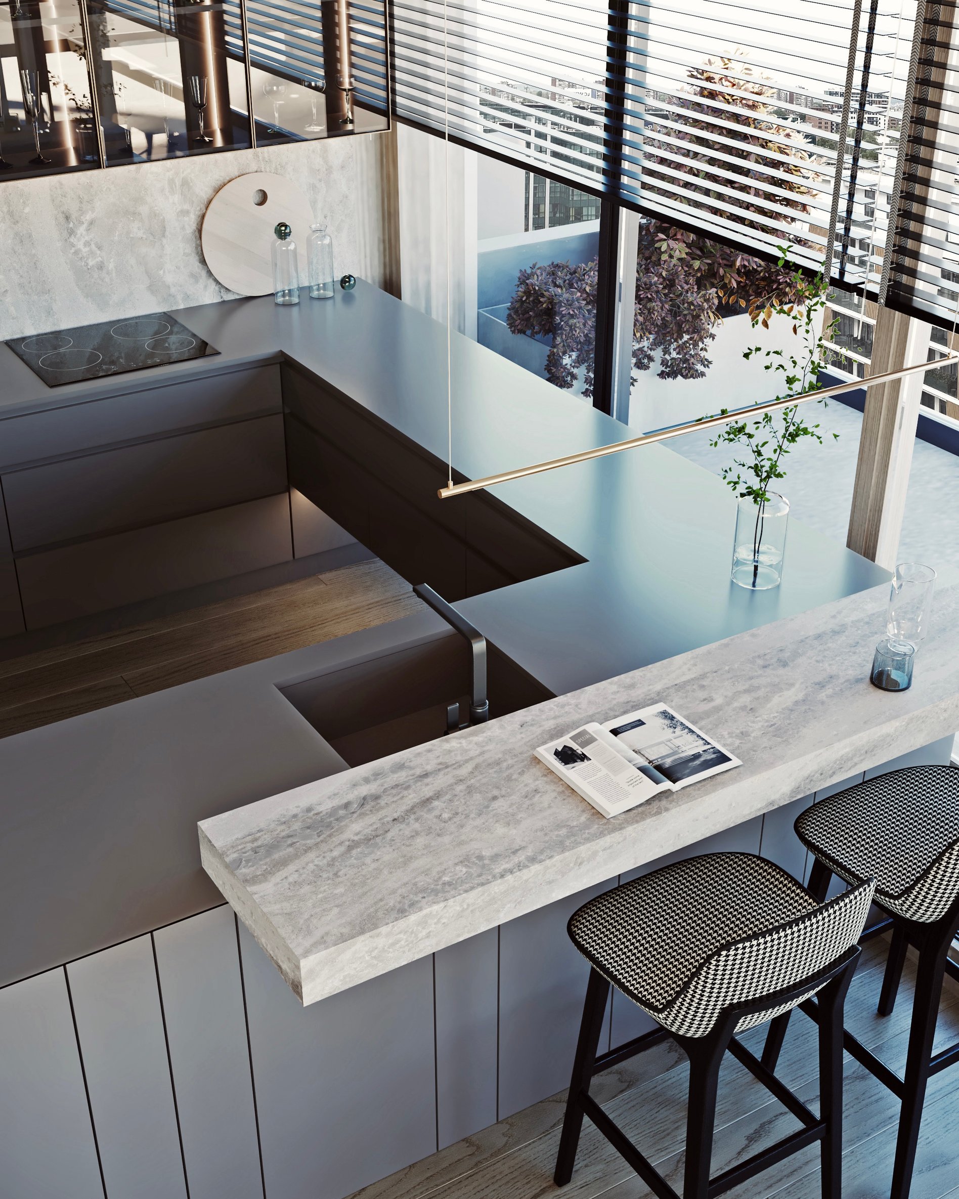 Contemporary kitchen detail with marble countertop, integrated appliances, and custom storage solutions.
