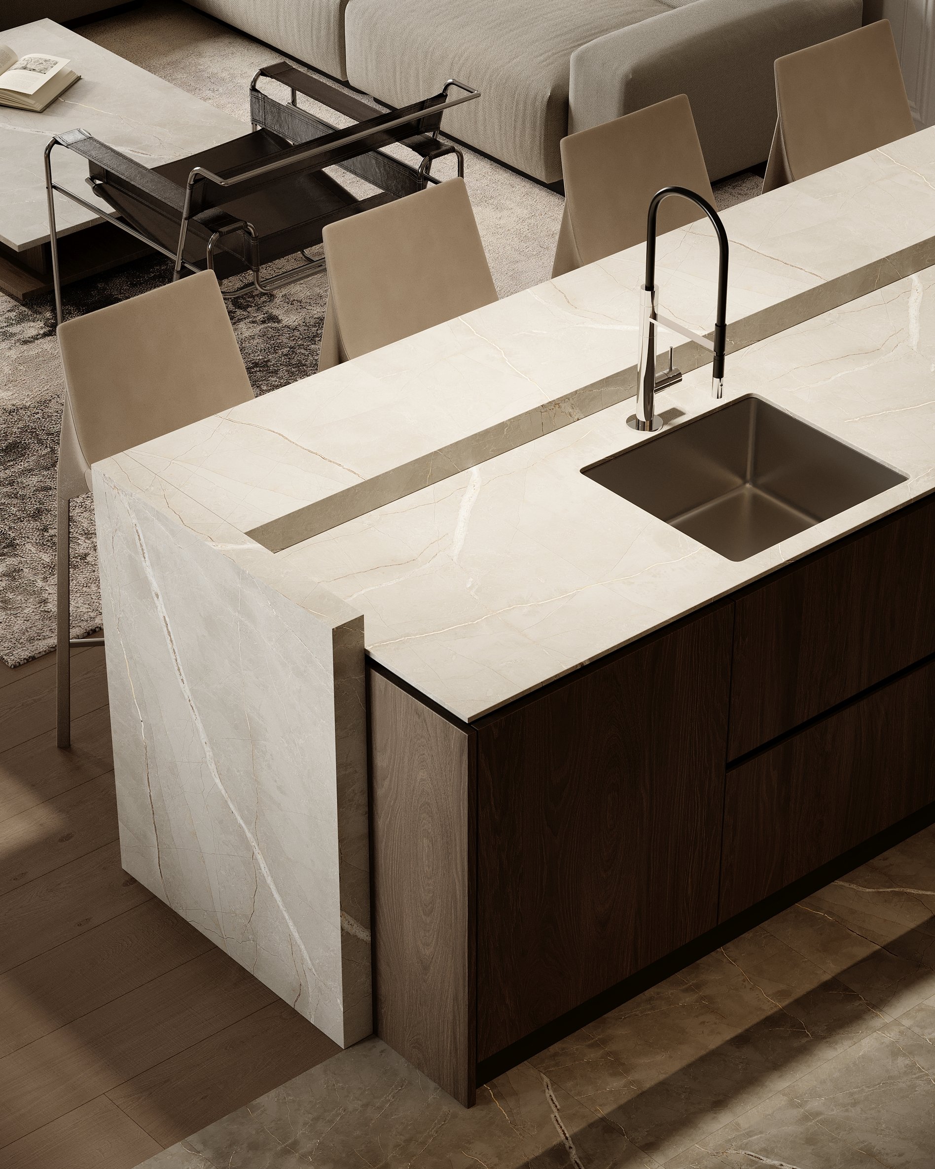 Luxury kitchen island with marble waterfall edge, matte black sink, and contemporary bar seating.