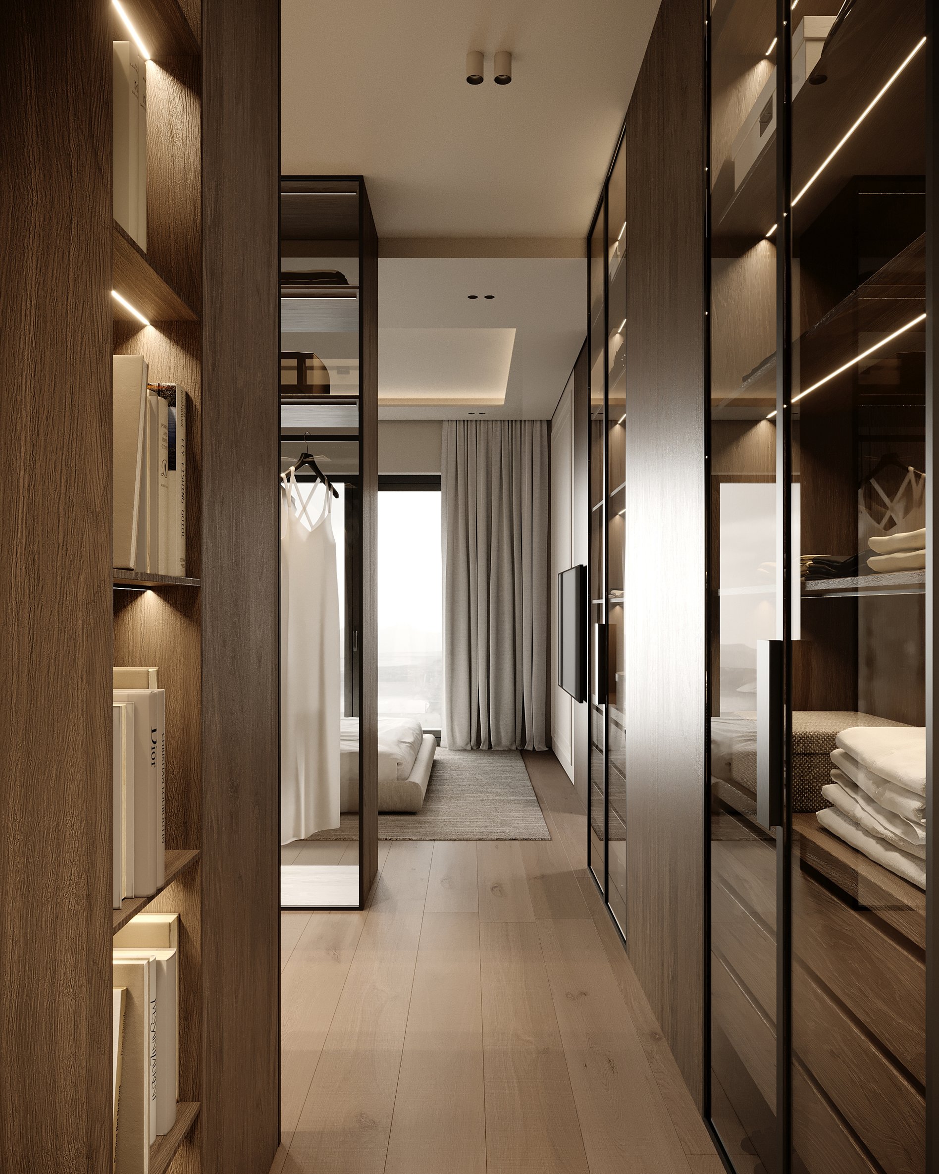 Luxurious walk-in closet with glass doors, integrated LED lighting, and wooden storage systems.