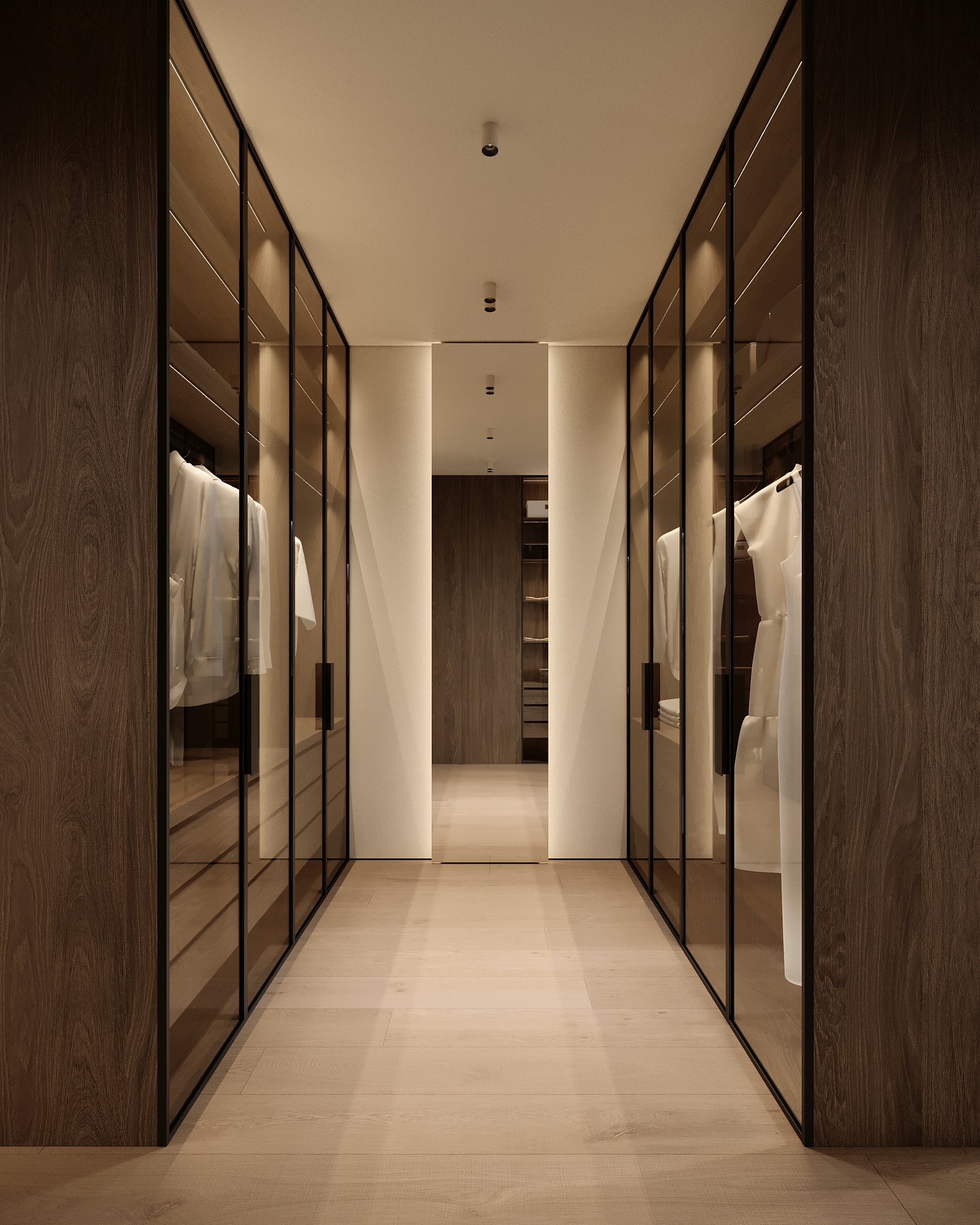 Elegant walk-in closet corridor with mirrored doors, wooden frames, and integrated lighting system.
