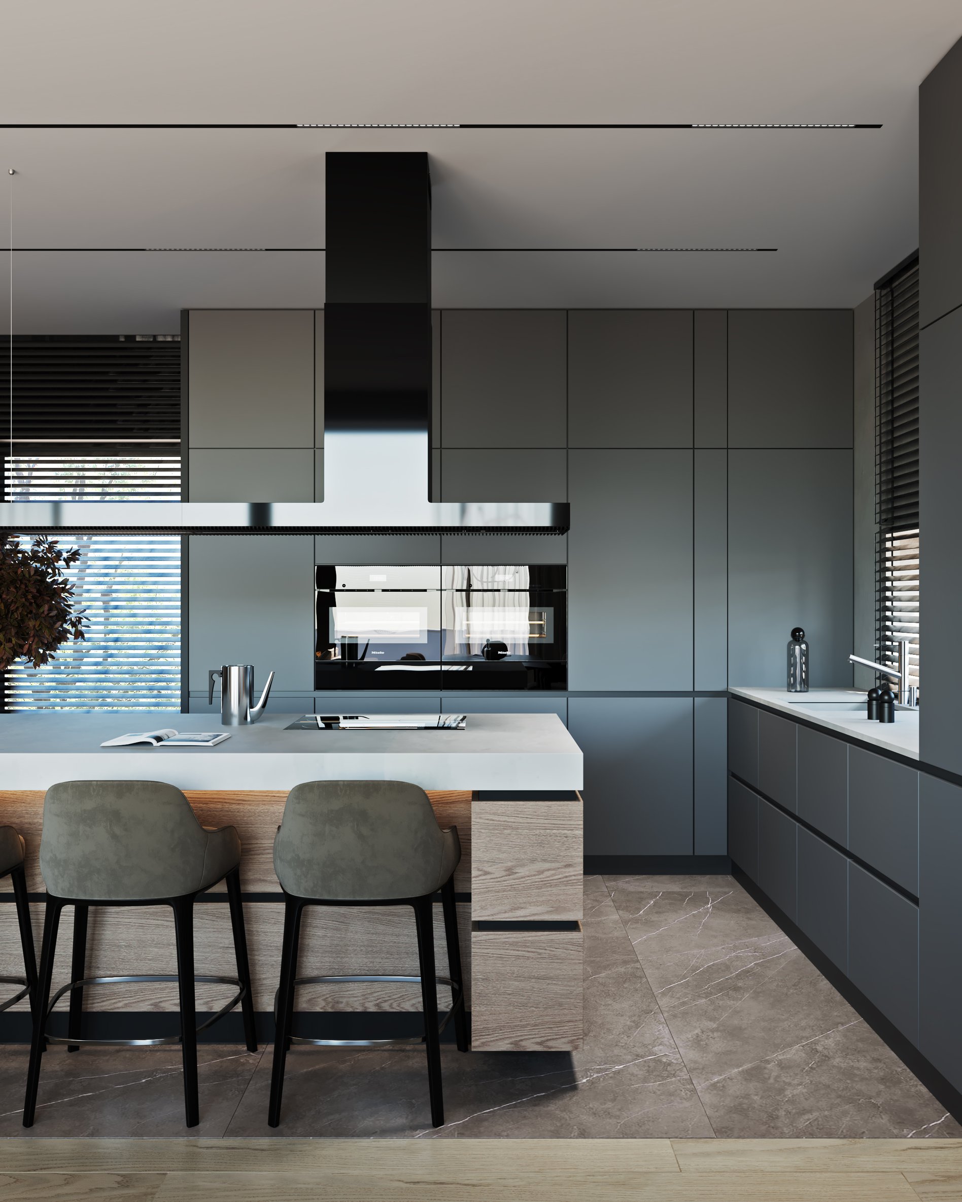 Contemporary kitchen featuring grey cabinetry, white countertops, and upholstered bar stools.
