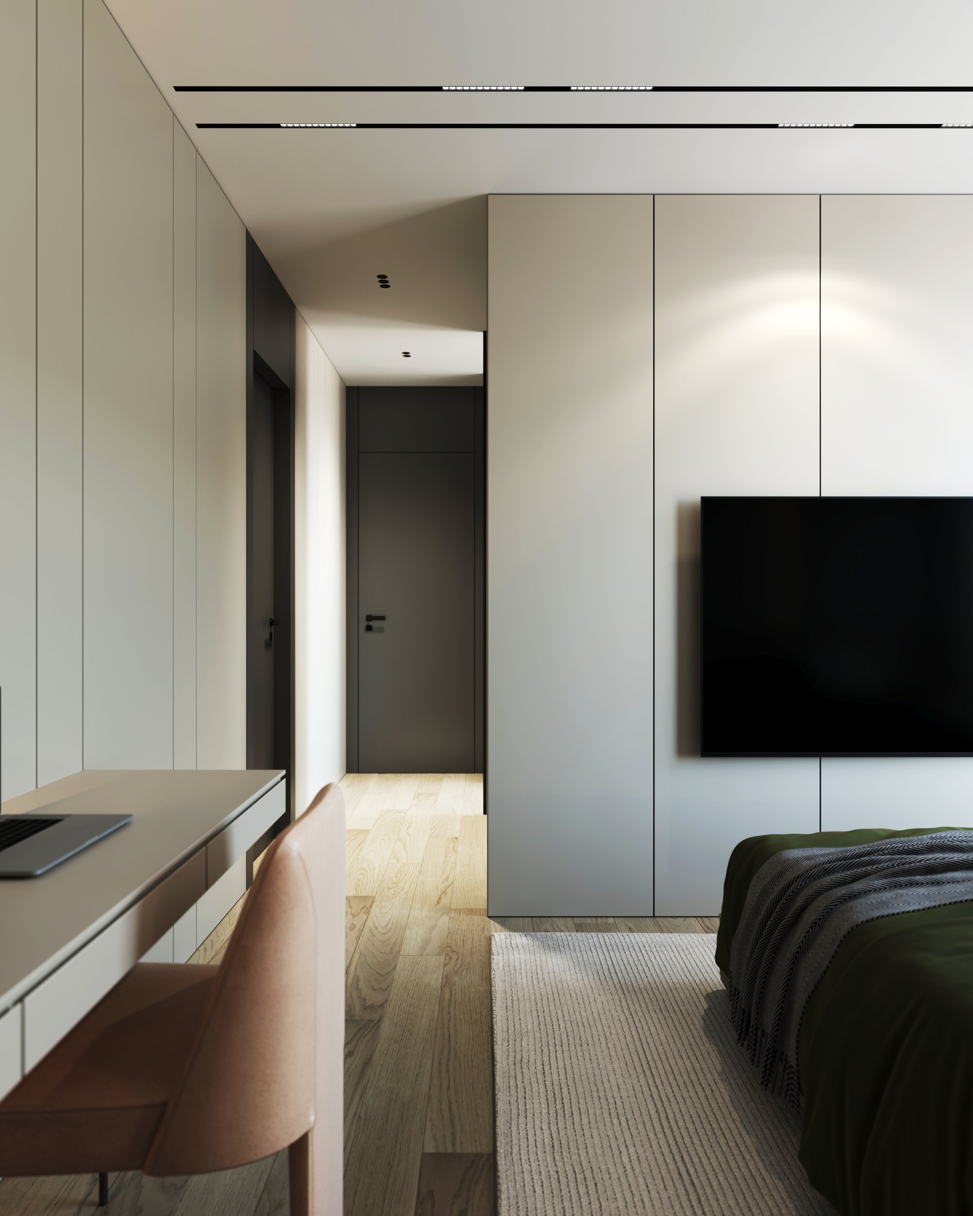 Modern bedroom with integrated workspace featuring built-in desk and storage.