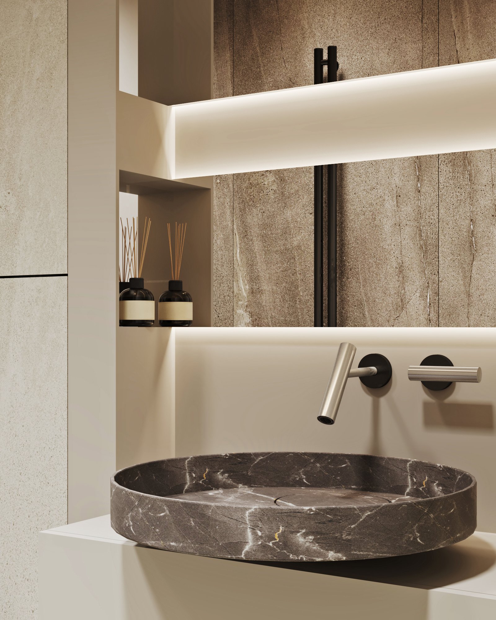 Close-up of bathroom vanity featuring circular black marble vessel sink, wall-mounted faucet, and backlit storage niches.