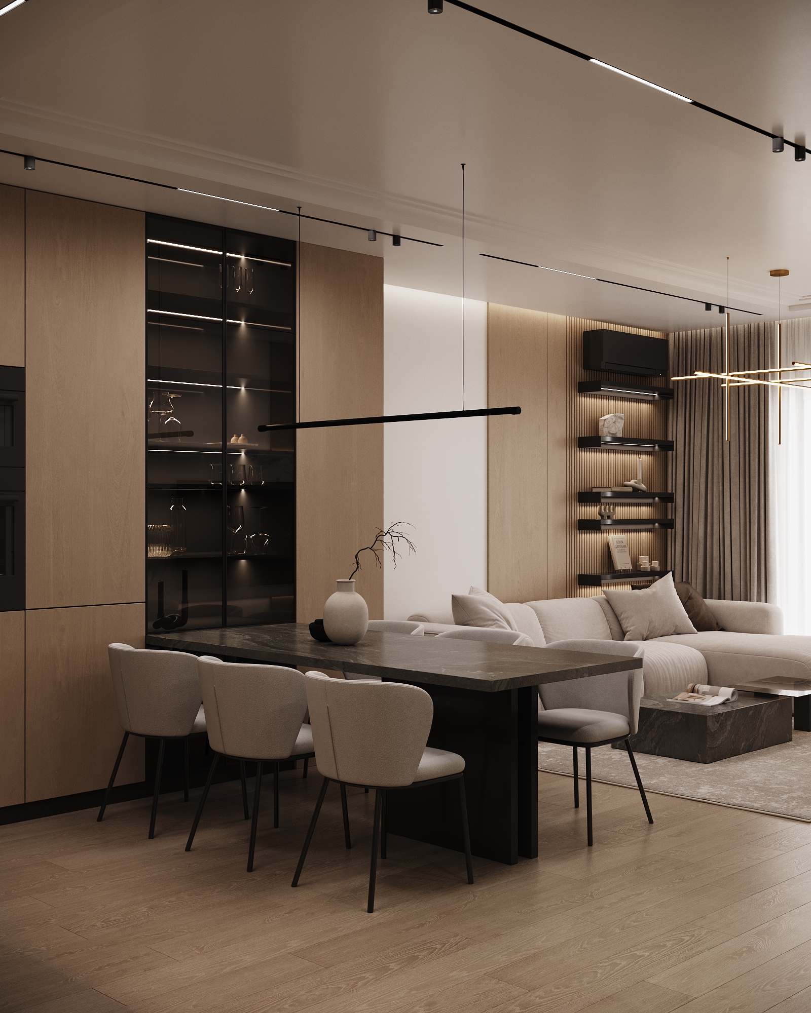 Open concept living and dining space with sectional sofa, dining table, and glass display storage.