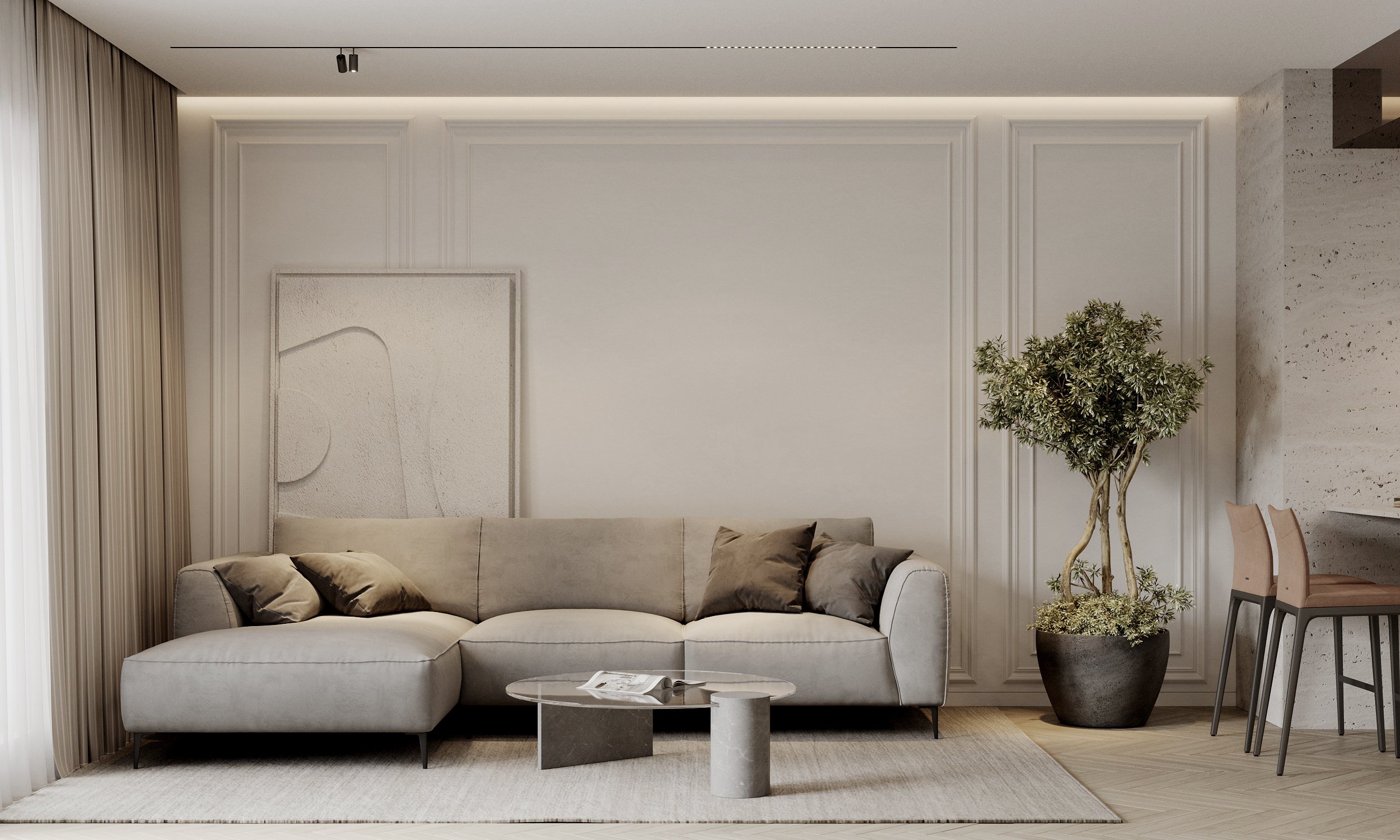 Contemporary living room with grey sectional sofa, abstract artwork, and potted olive tree.