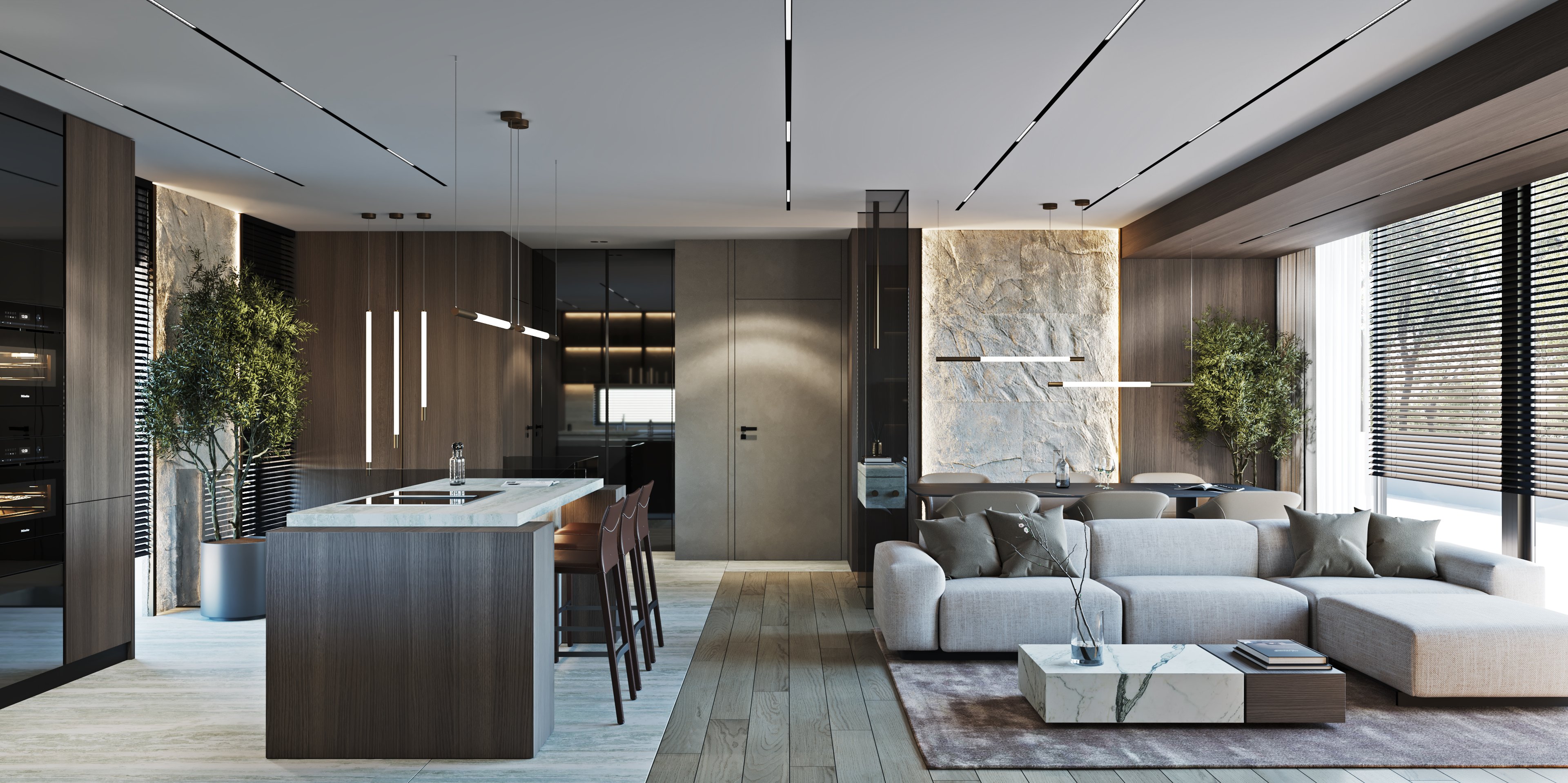 Open concept living and dining area with designer lighting, grey sectional sofa, and marble accents.
