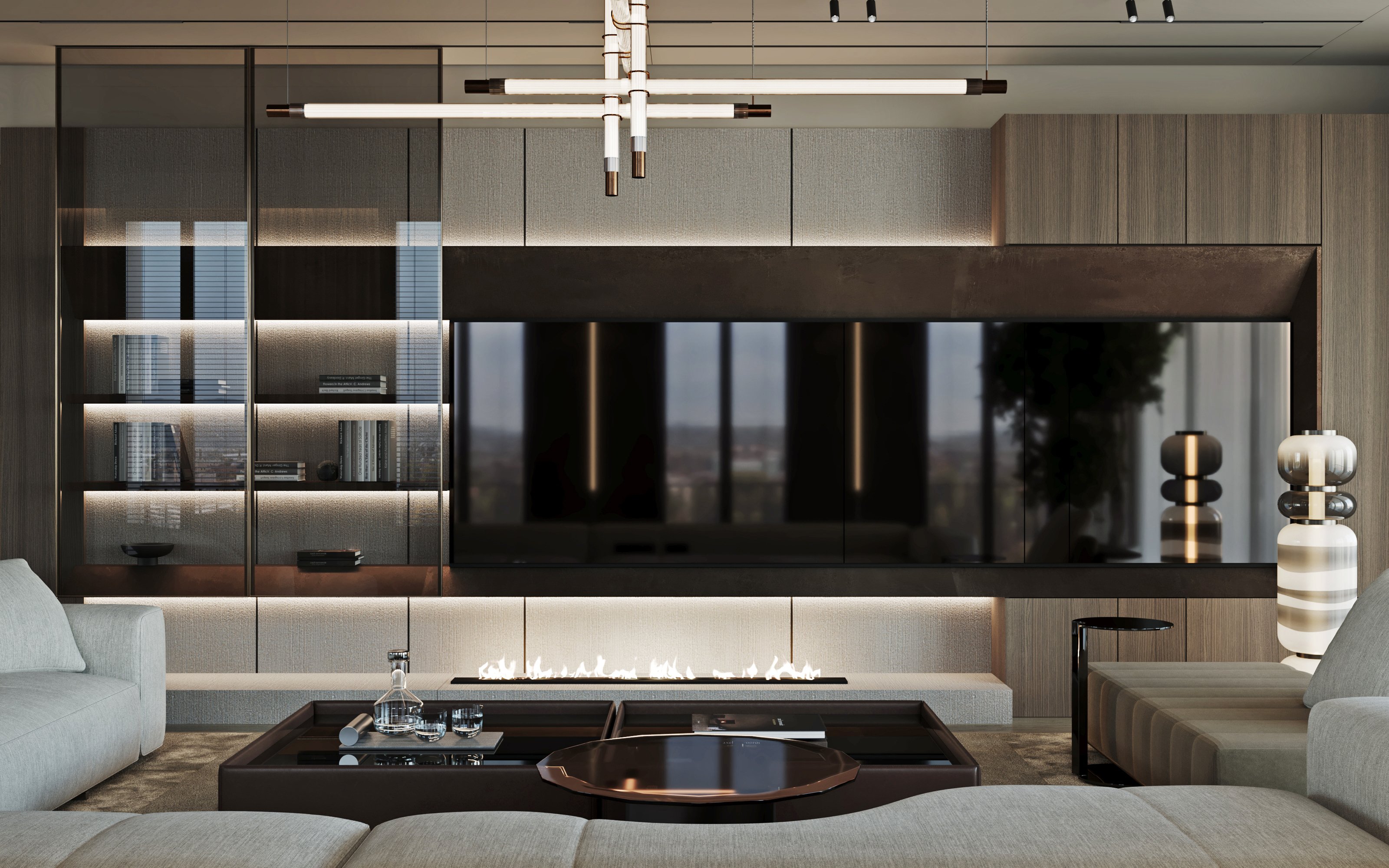 Contemporary living room with built-in fireplace, large TV, and stylish shelving unit.