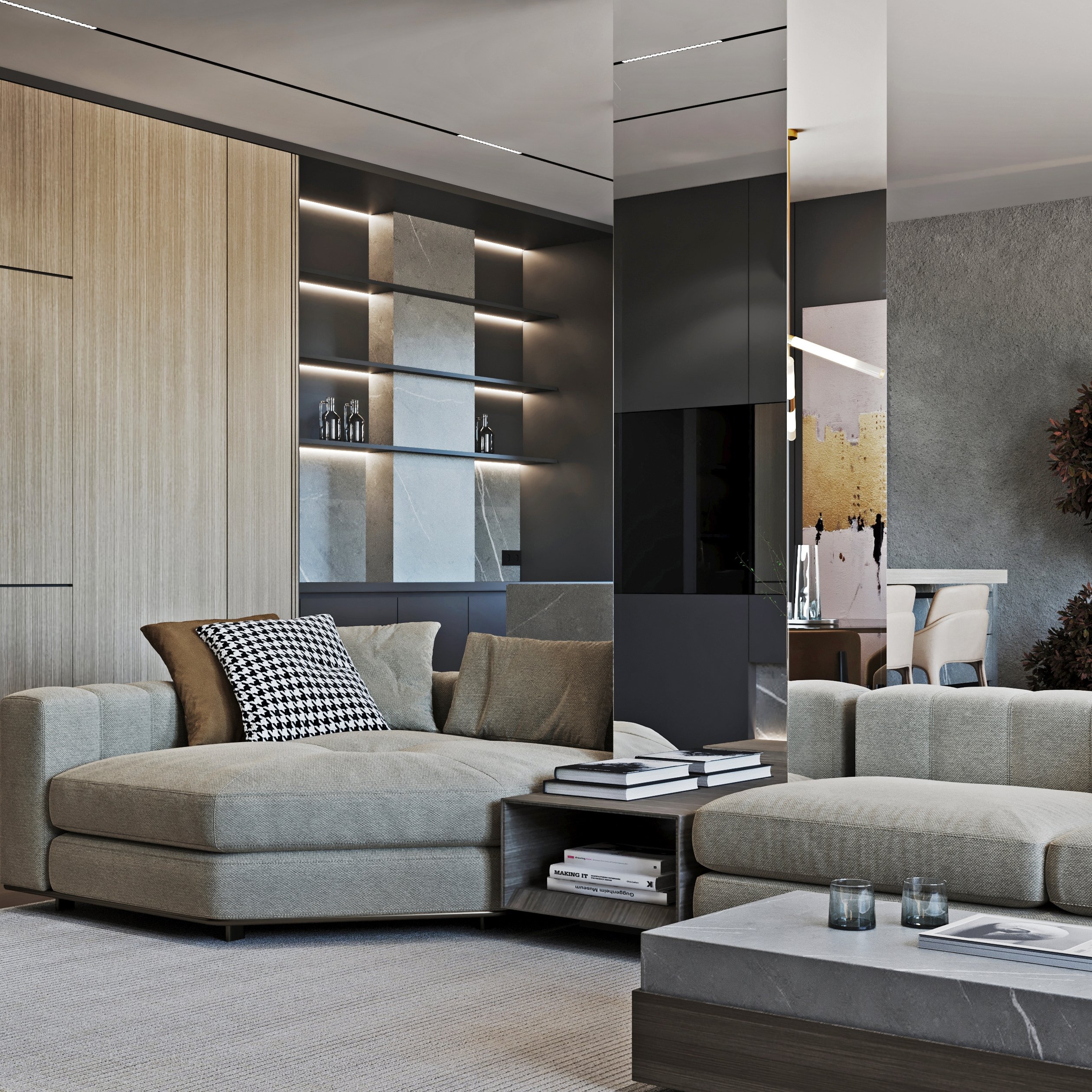 Detailed view of living room showing grey sectional sofa, built-in shelving with LED lighting, and houndstooth pattern cushions.